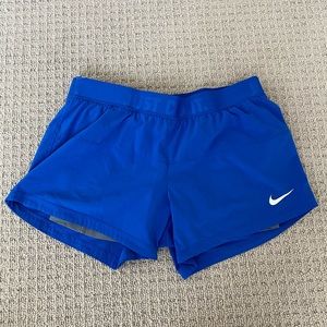 Blue nike workout shorts with built in spandex